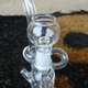 Illustration for article titled VapeXhale Cloud EVO HydraCycler Review: It's Fan"dab"ulous!